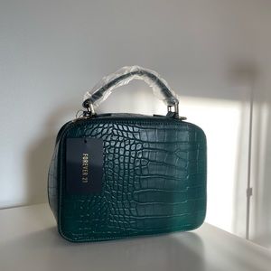 Green crocodile print purse from Forever 21 , never used